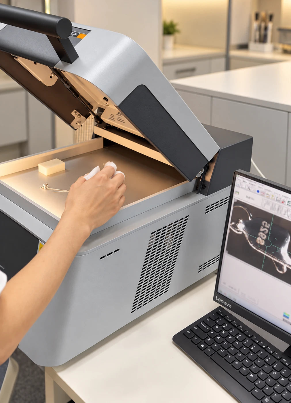 Illustrative jewelry coating inspection equipment in a warm laboratory